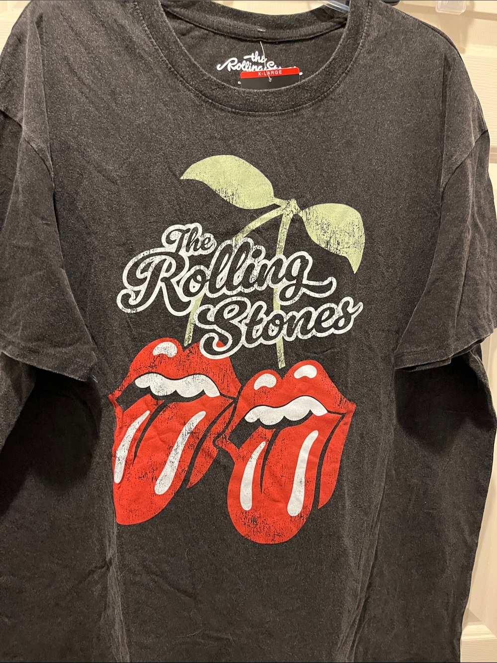 the Rolling Stones Black Cherry Tee with Red Tongue Logo and Green Accent